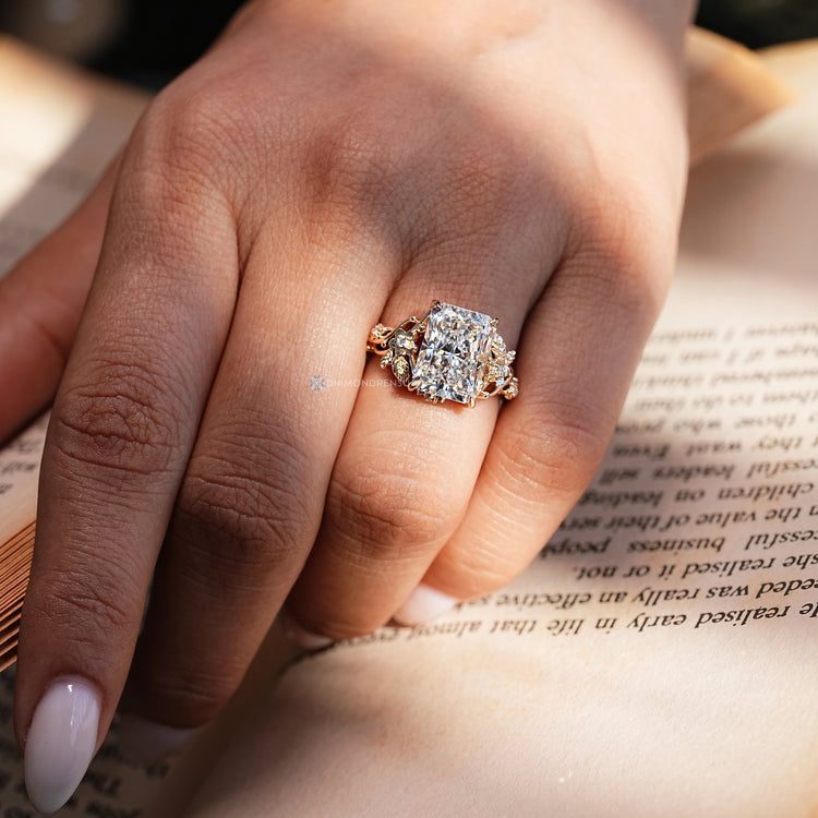 Radiant engagement ring with a flower design.