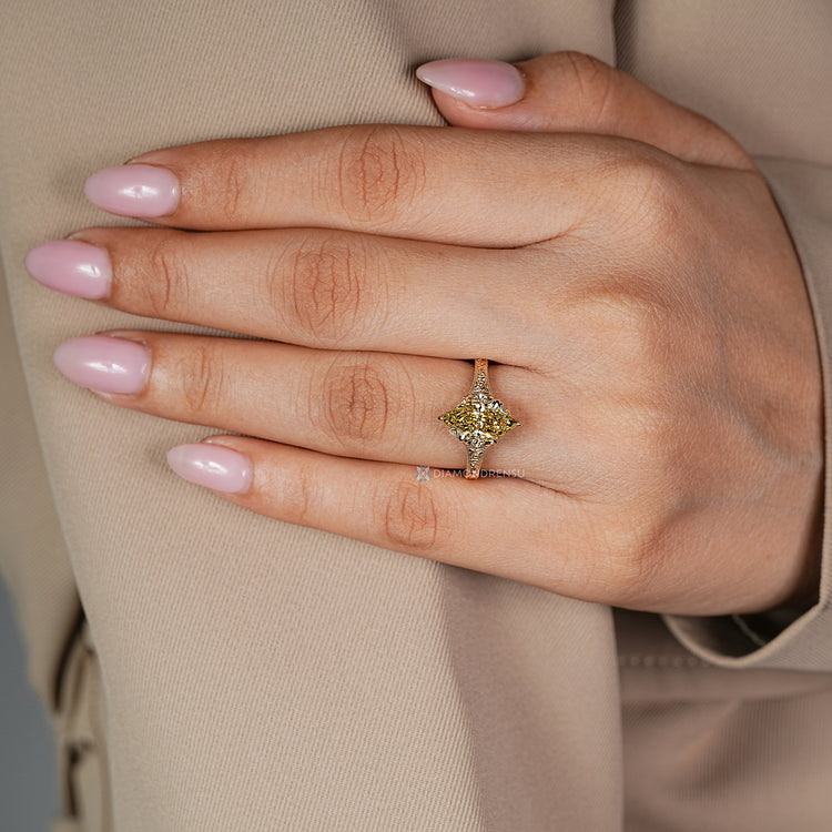 Claw prong setting secures the Dutch marquise diamond.