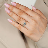 Pave round cut diamond ring with tapered shank.