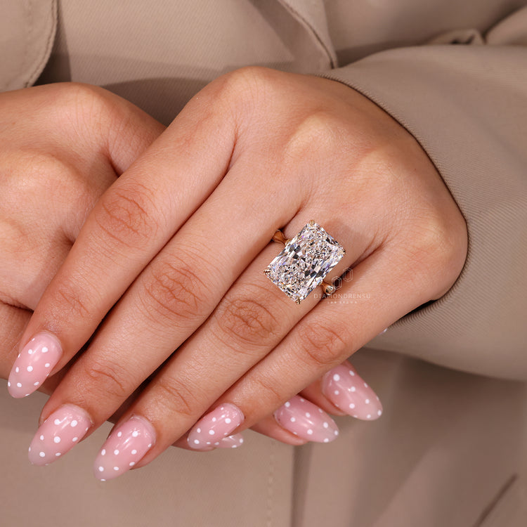 Radiant cut lab grown diamond ring with bamboo band design.
