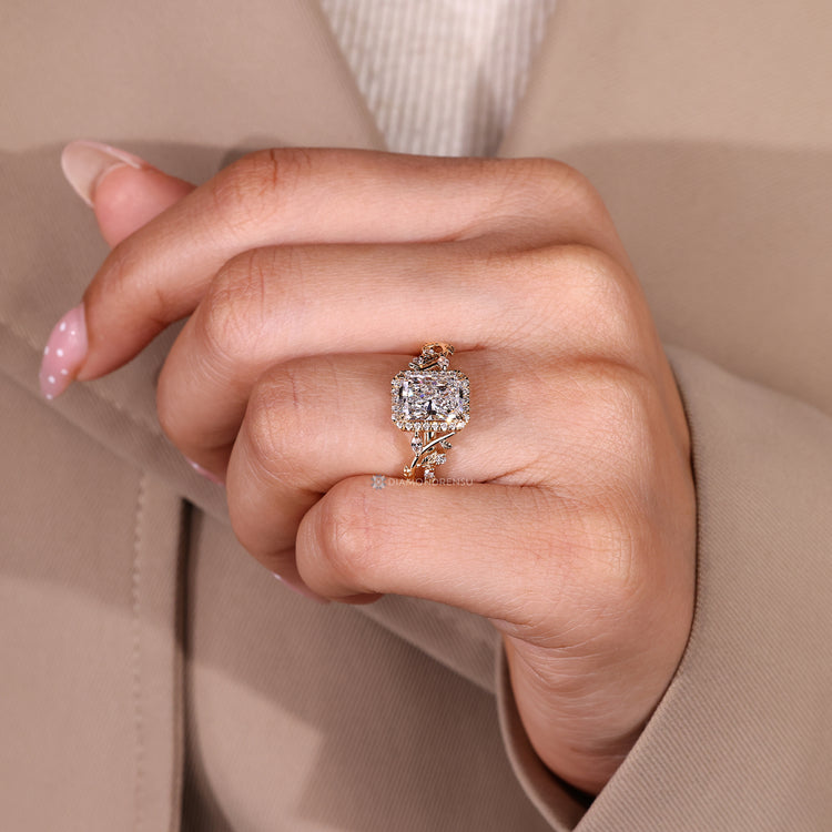 Lab grown diamond ring with marquise accents and halo style.