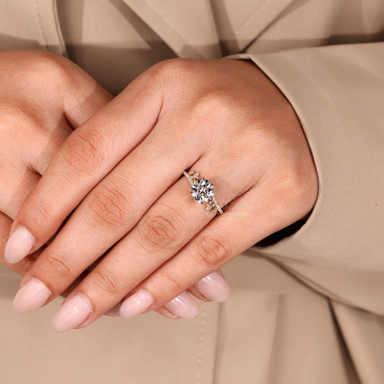 Nature inspired ring with round old european cut diamond and bypass design.
