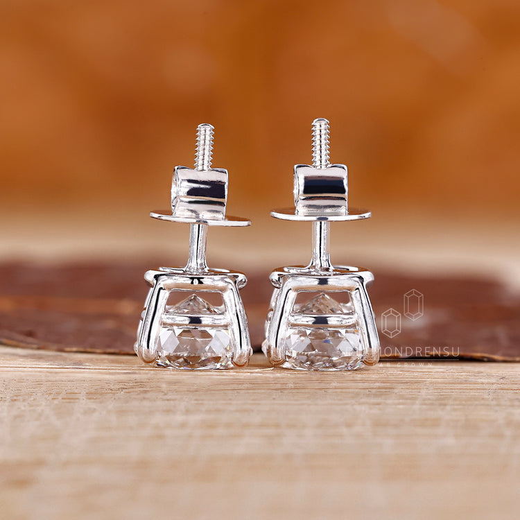 Diamondrensu Portuguese cut diamond earrings with four prong design.