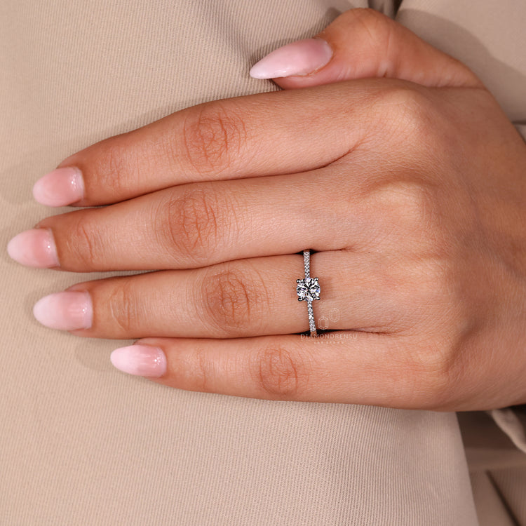 Round diamond engagement ring with lab grown diamond and tapered shank.