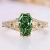 Green coffin cut diamond ring.