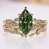 Green Dutch marquise bridal set with round side stones.
