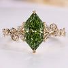 Nature inspired engagement ring with a green Dutch marquise.