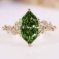 Nature inspired diamond ring with a green Dutch marquise.