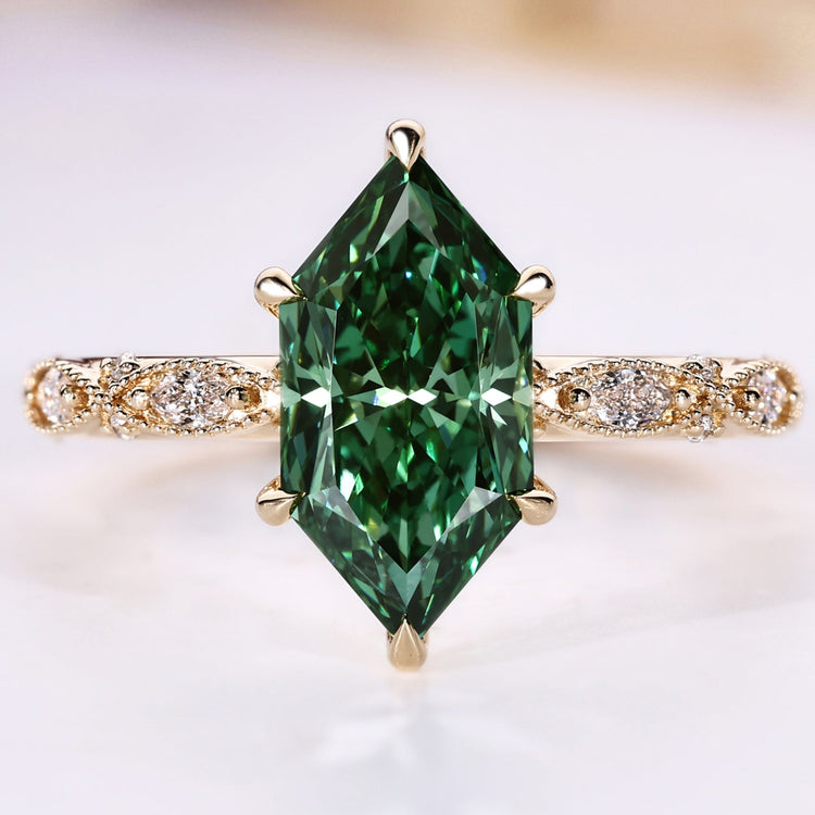 Dutch marquise diamond ring with round and marquise cut pavé.