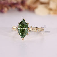 Diamondrensu Dutch marquise ring with lab grown diamond center.
