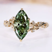 Marquise cut ring in green with nature inspired style.