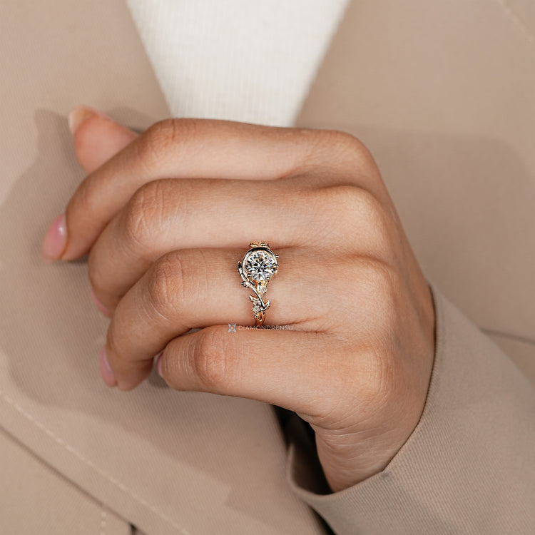 Three prong bezel engagement ring with round diamond.
