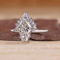 Diamondrensu coffin ring with lab grown diamond center stone.
