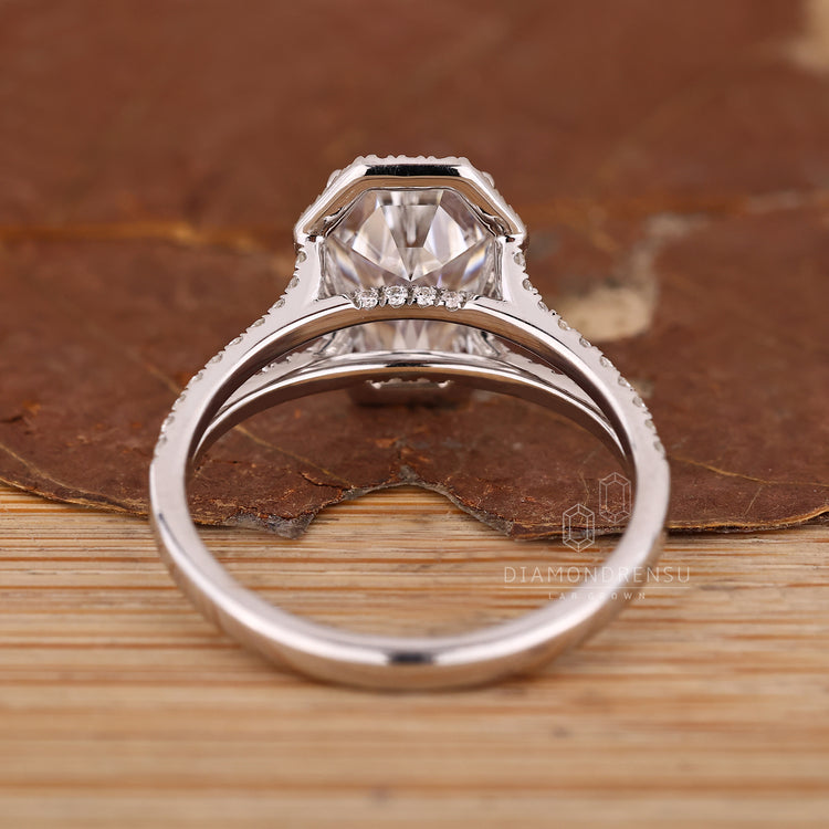 Lab grown diamond ring with coffin center and split shank design.