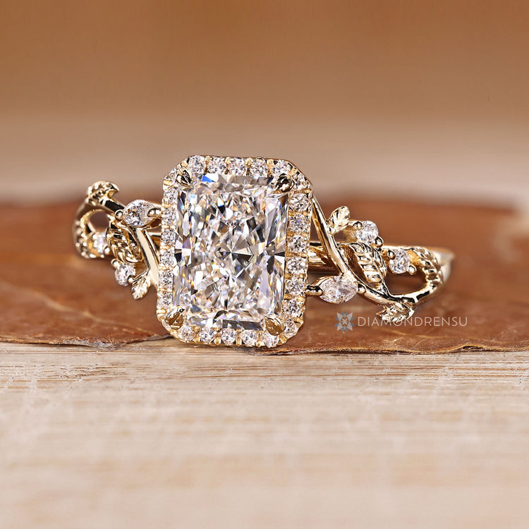 Diamondrensu radiant ring with lab grown diamond center.