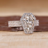 Coffin cut engagement ring with art deco and vintage style design.