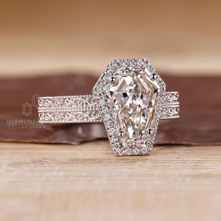 Coffin cut engagement ring with art deco and vintage style design.