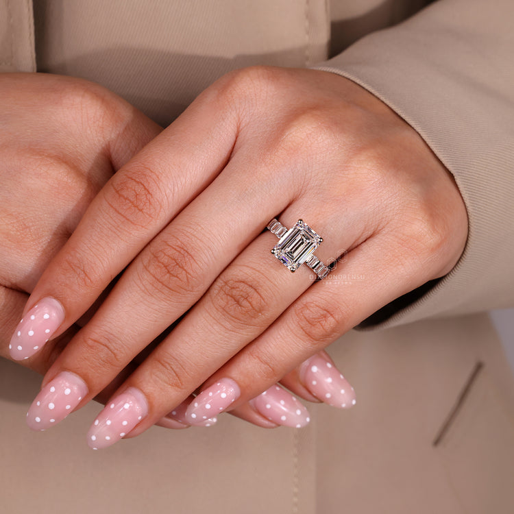 Lab grown emerald cut diamond ring with IGI certification.
