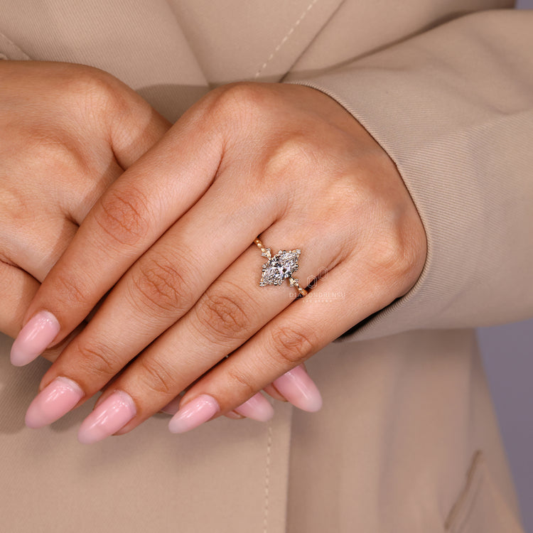IGI certified marquise ring with lab grown diamond center.