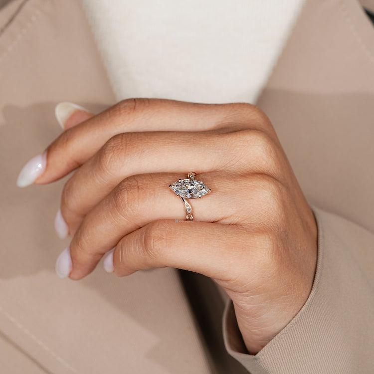 Marquise engagement ring with a six claw prong setting.