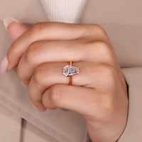 Coffin diamond ring with cathedral setting and clean profile.