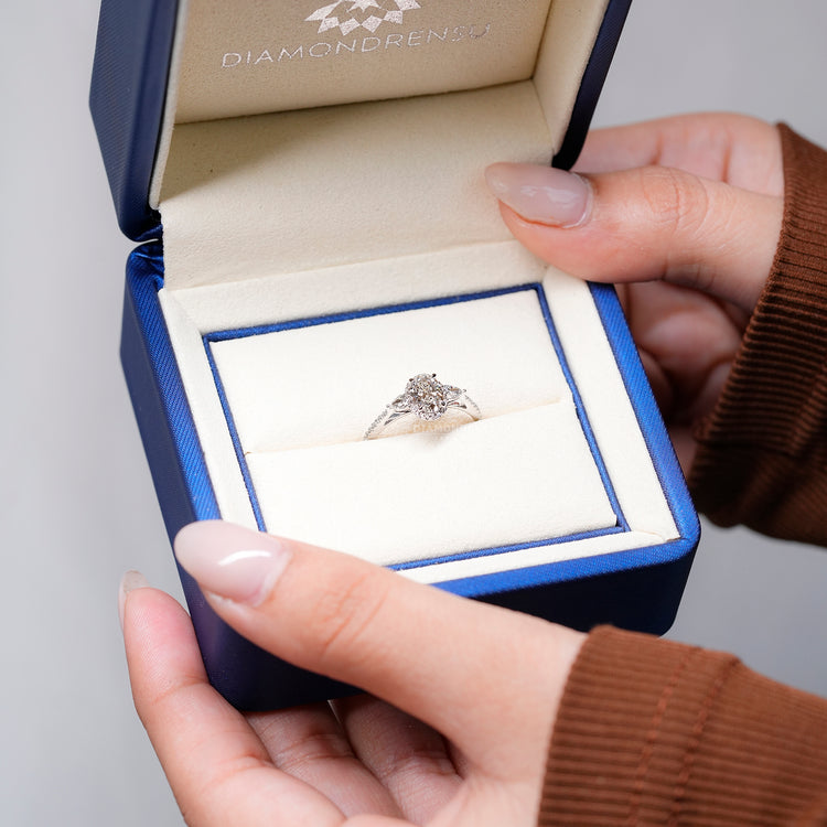 IGI certified oval diamond ring with tapered shank.
