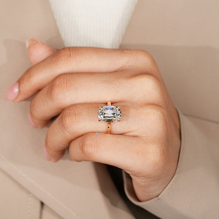 Cushion old mine cut ring with a solitaire style setting.