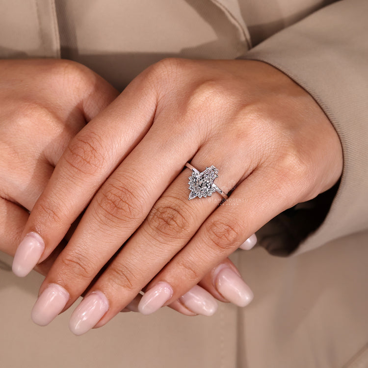 Lab grown diamond ring with coffin center and half halo design.