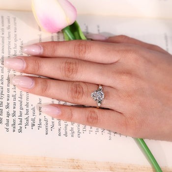 Handmade nature inspired ring with four claw prong setting.