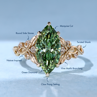 Green marquise center stone with a six claw prong setting.