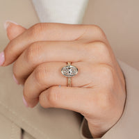 IGI certified oval lab grown diamond ring with bezel.
