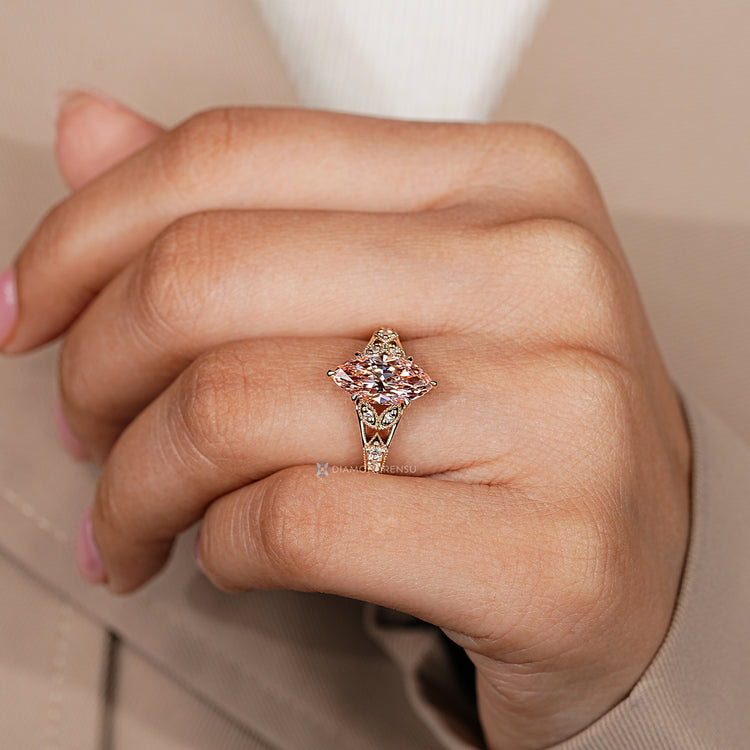 Tapered shank with milgrain details on an Art Deco diamond ring.