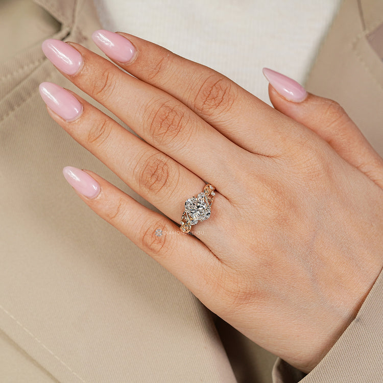 Lab grown diamond completes this nature inspired engagement ring.