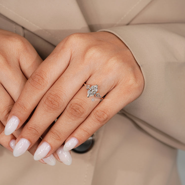 Dutch marquise three stone ring with a tapered shank.