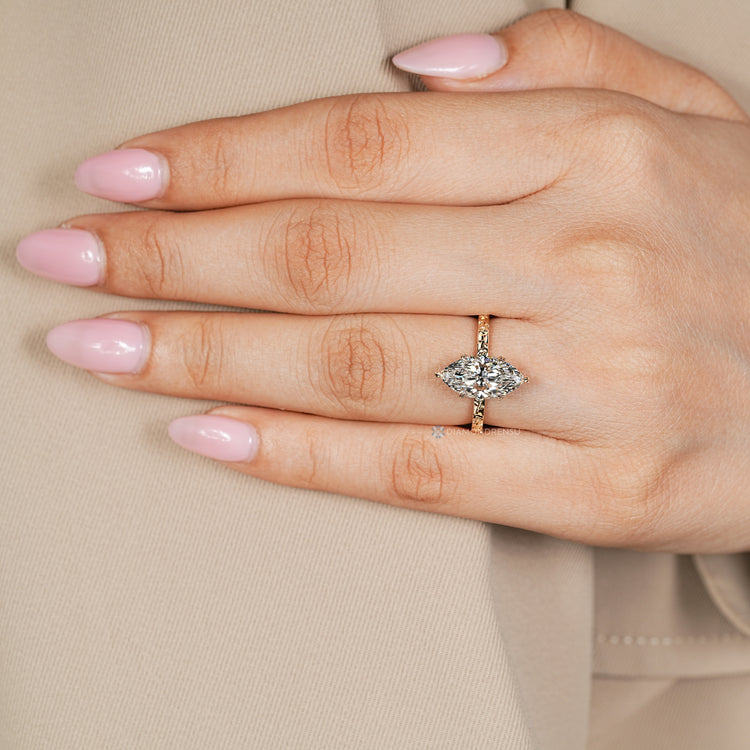 Handmade marquise center stone engagement ring by Diamondrensu.