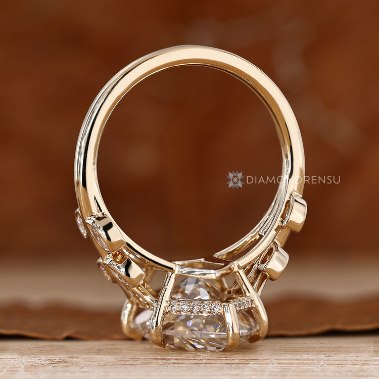 Dutch marquise engagement ring with a cluster setting and hidden halo.