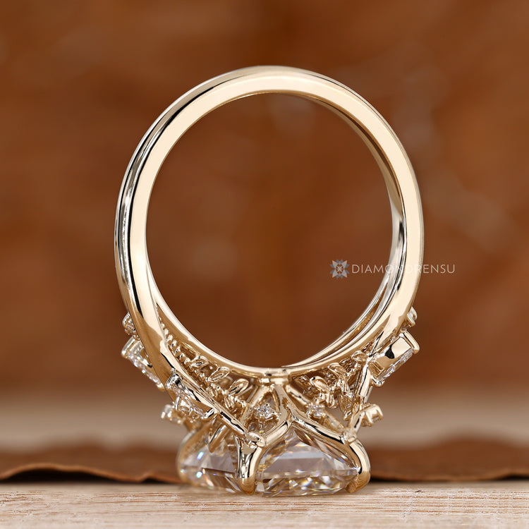 Radiant diamond engagement ring with milgrain prong details.