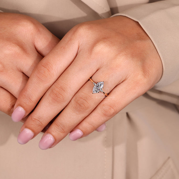 Six claw prong marquise center with pear side stones.