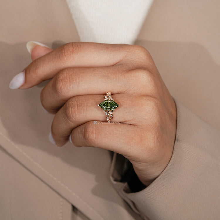 Nature inspired engagement ring with filigree details.