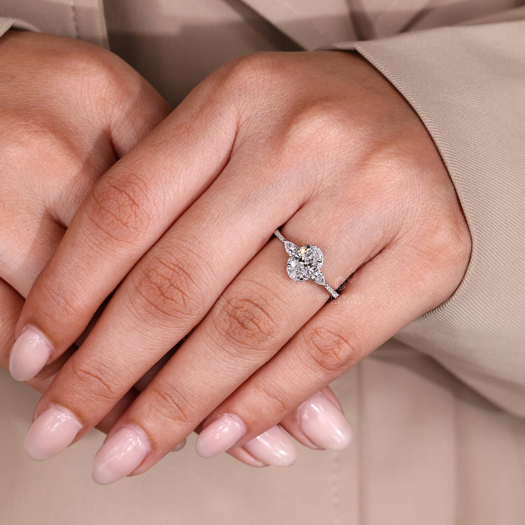 IGI certified oval ring with halo and tapered shank.