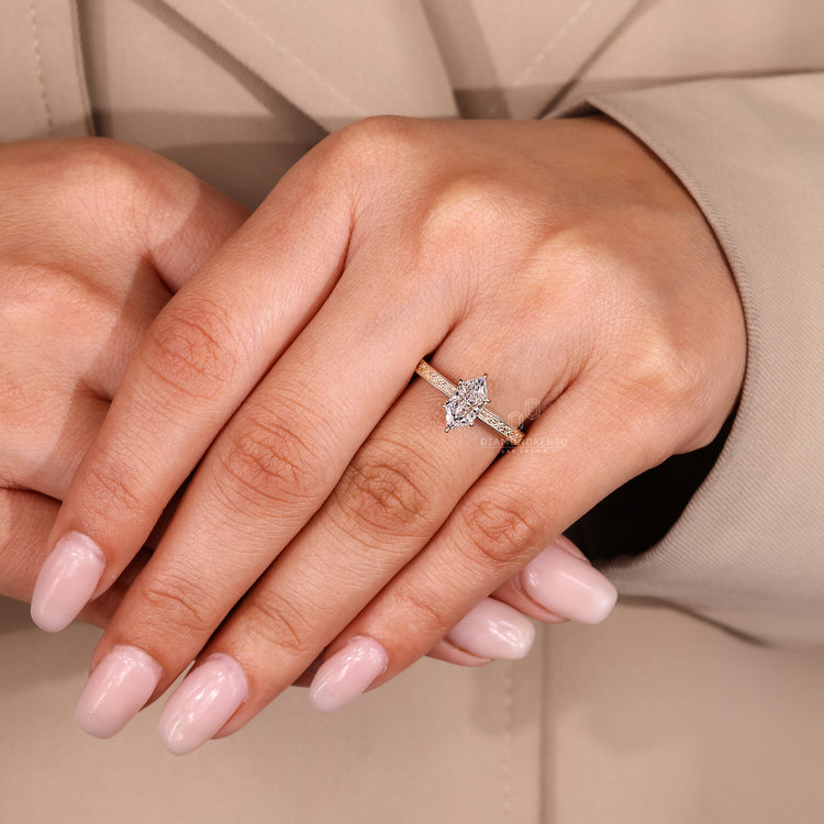 Dutch marquise ring with milgrain details and ocean wave band.