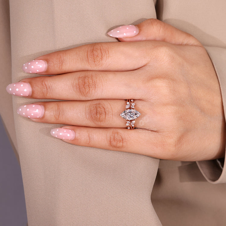 Diamondrensu handmade marquise ring with cluster setting.
