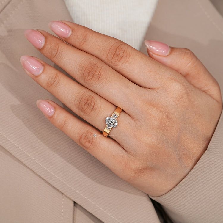 IGI certified oval cut diamond ring with baguette stones.