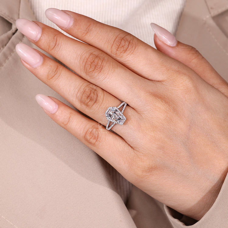 Handmade engagement ring with halo style and four prong setting.