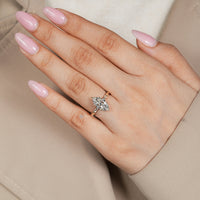Marquise engagement ring with a six leaf style prong setting.
