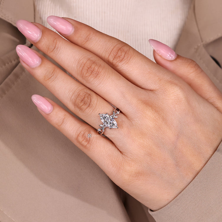 Diamondrensu nature inspired ring with lab grown diamond center.