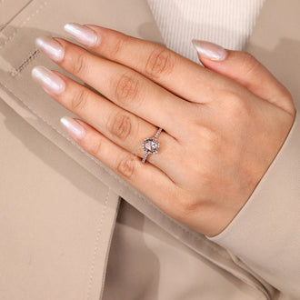 Rose gold ring with rose cut diamond in 6 prong setting.
