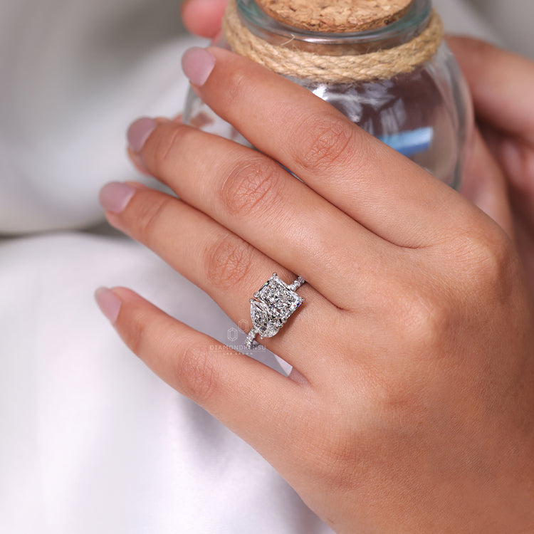 Round cut pave setting engagement ring with a row of diamonds, designed for extra shine.
