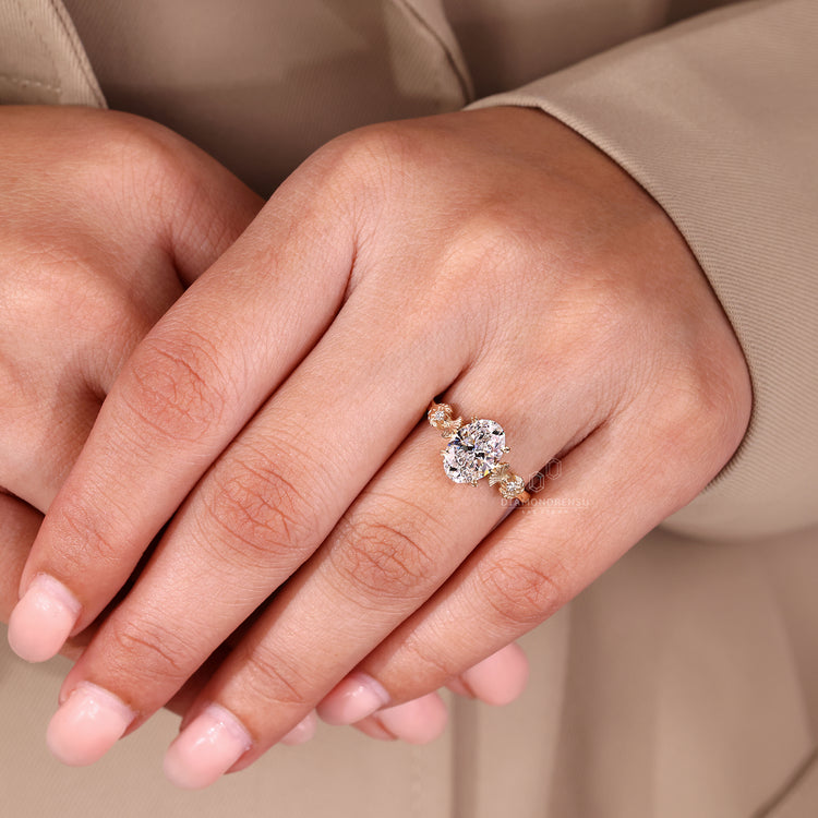 Custom engagement ring with oval diamond and handcrafted precision.
