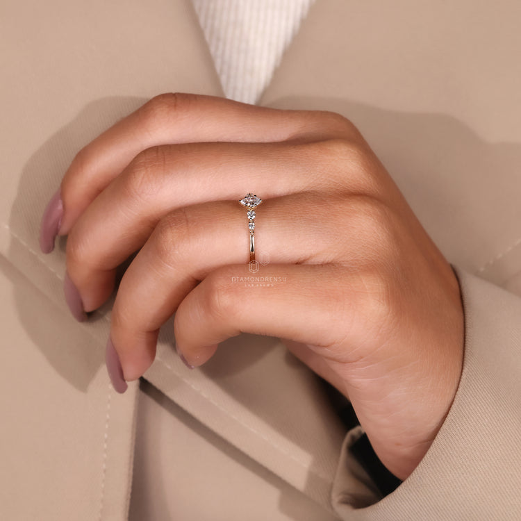 Custom engagement ring with 5 stone diamonds and 6 prong yellow gold setting.
